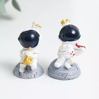 Сувенир полистоун "Космонавт-музыкант" МИКС 4х3х3 см