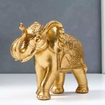 Сувенир полистоун "Слон с пальмовыми листьями на попоне" золотой 16,7х8х20,2 см