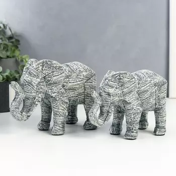 Сувенир полистоун "Слоны. Газетные вырезки" набор 2 шт 13,5х8,5х19 см 15,5х9х21 см