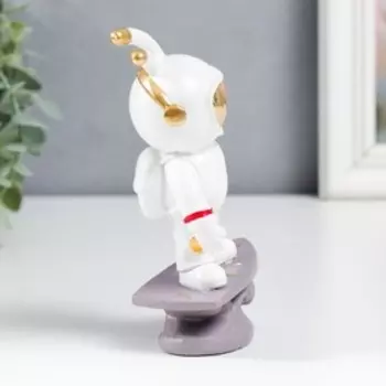 Сувенир полистоун "Заяц-астронавт в наушниках на сёрфе" 15х7,5 см