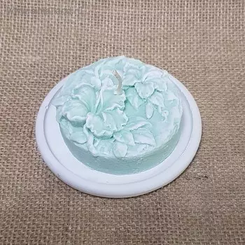 Свеча "Лилии" на подставке мятная 9,5х4