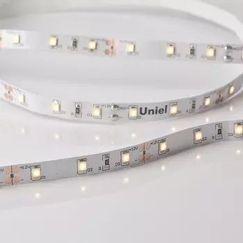 Светодиодная лента на самоклеящейся основе Uniel, IP20, 5 м, 2835, 60 LED/м, 4,8 Вт/м, 12 В, 3000К, свечение тёплое белое