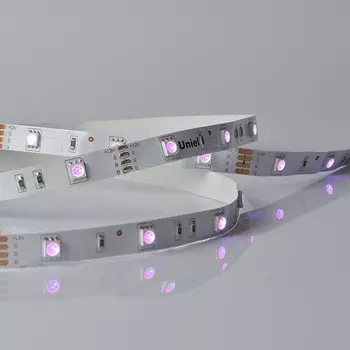 Светодиодная лента на самоклеящейся основе Uniel, IP20, 5 м, 5050, 30 LED/м, 7,2 Вт/м, 12 В, свечение RGB