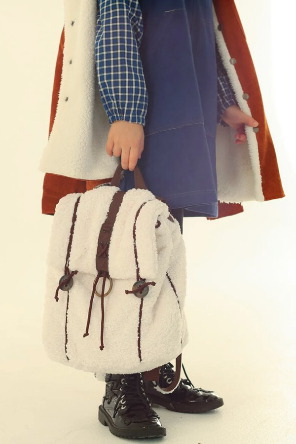 из искусственной овчины