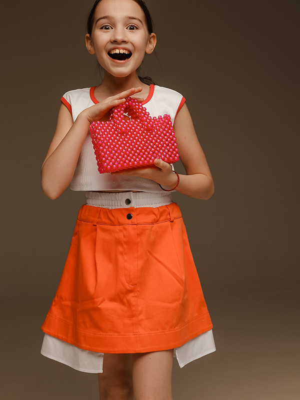 Коралловая детская юбка с поясом-имитацией нижнего белья и хлопковой вставкой