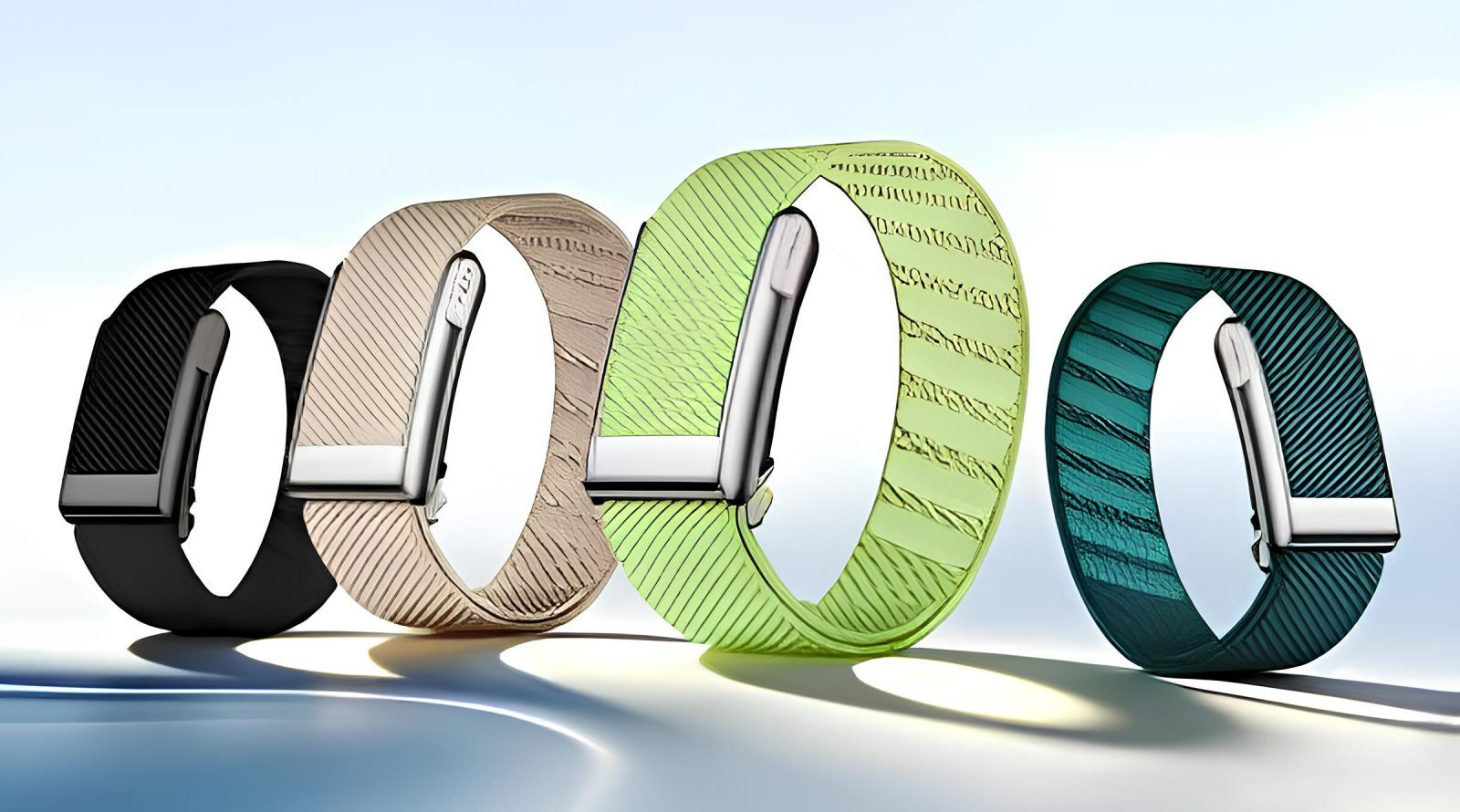 Четыре стильных браслета разных цветов на светлом фоне, современный дизайн.