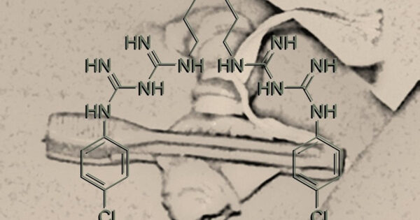 Химическая структура хлорина над изображением старинного инструмента для точности.