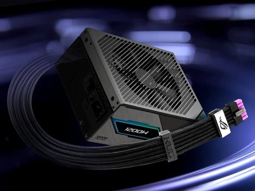 Блок питания ASUS 1200W с кабелями на фоне темной поверхности.