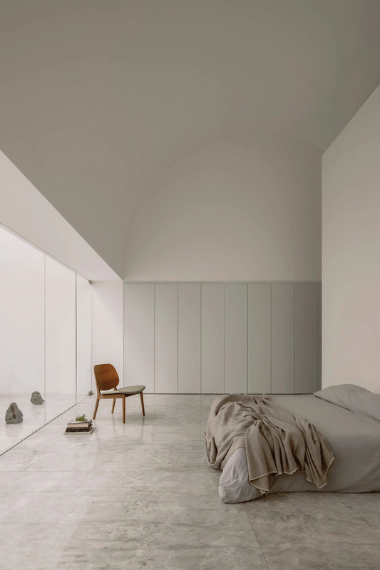 A bedroom in the minimalist Casa Sin Nombre residence by HW Studio. Photo by Cesar Bejar.