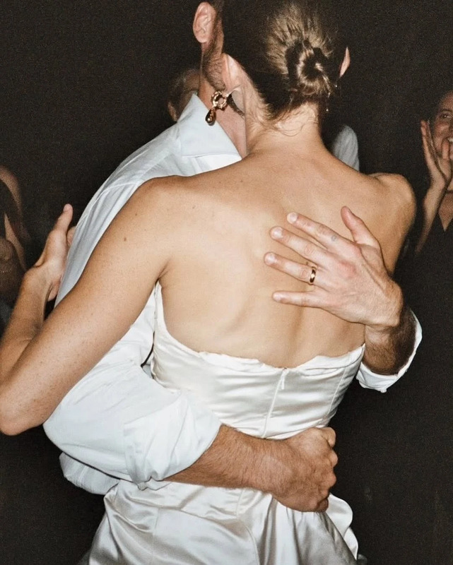 Monica Beštek, in a vintage Vera Wang dress, and Benjamin Ruane at their wedding in Cadaqués, Spain.
