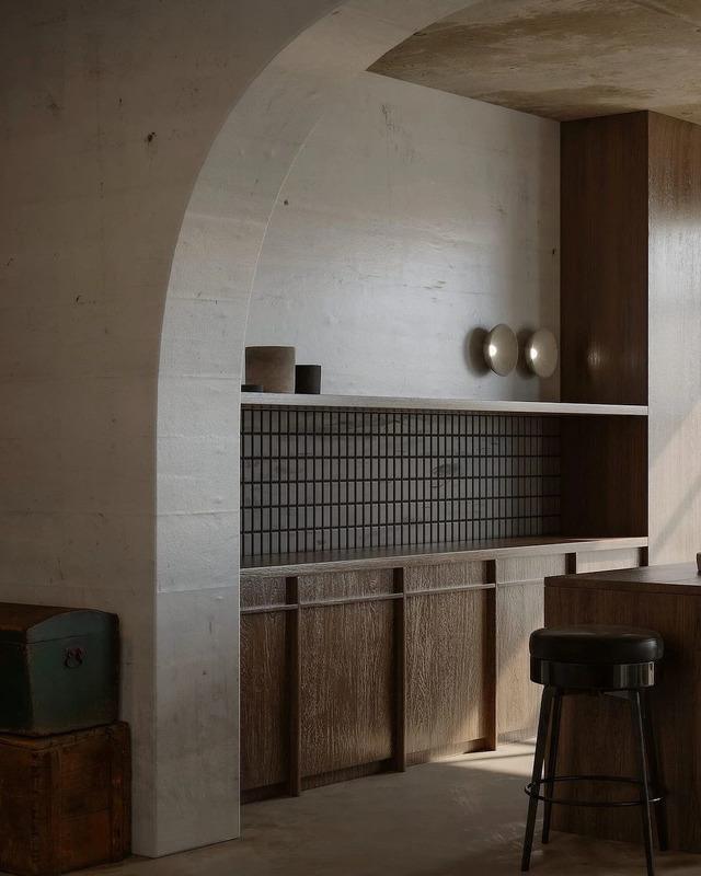 An architectural visualization by Lobo Studio blending Brutalist and Japanese styles.