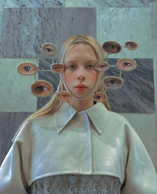 Artist Polina Osipova wears one of her surreal, wearable sculptures.