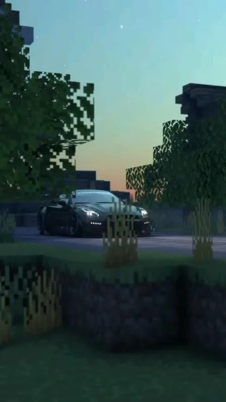 a car driving down a street next to trees and bushes in minecraft with the sun setting behind it