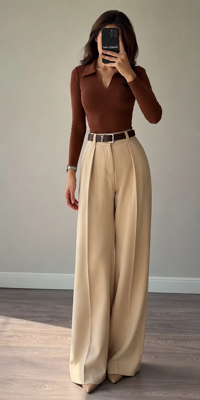 Upgrade your wardrobe with this stylish workwear attire inspo for women featuring a sophisticated fitted top and tailored wide-leg trousers. This elegant office outfit is perfect for a business casual look, professional fashion, minimalist wardrob...