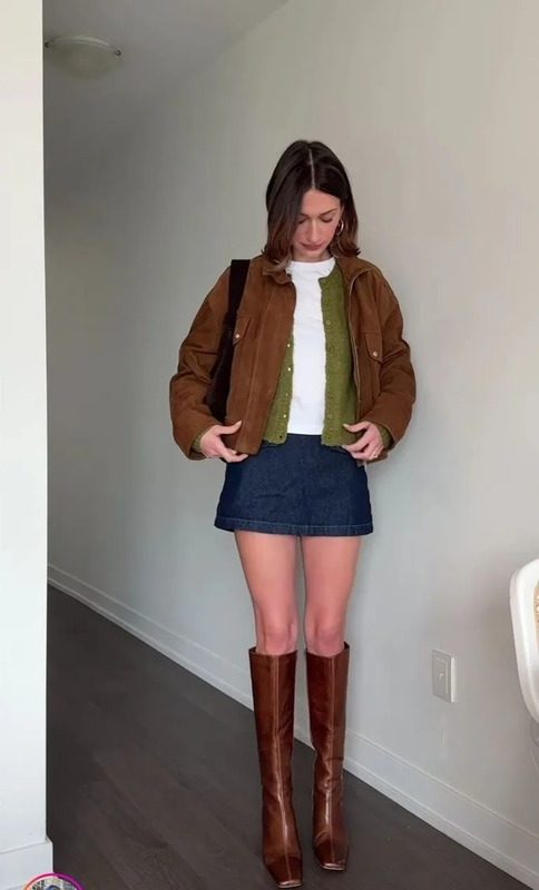 green cardigan layered outfit, suede jacket fall style, denim mini skirt travel look, cowboy boots soft western aesthetic, cozy layered European fashion, feminine fall outfit inspiration, romantic countryside fashion, dreamy transitional weather s...