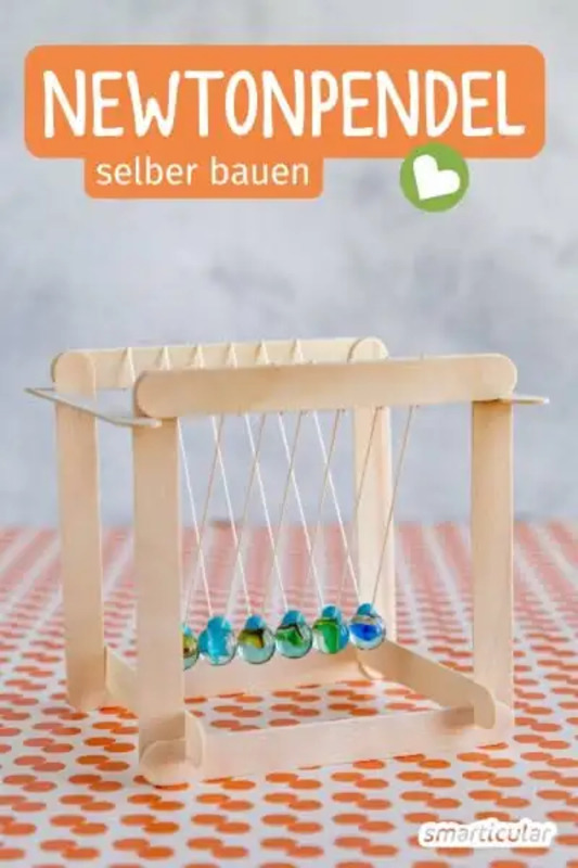 an old wooden abacust with the words newtonpendel selber bauen