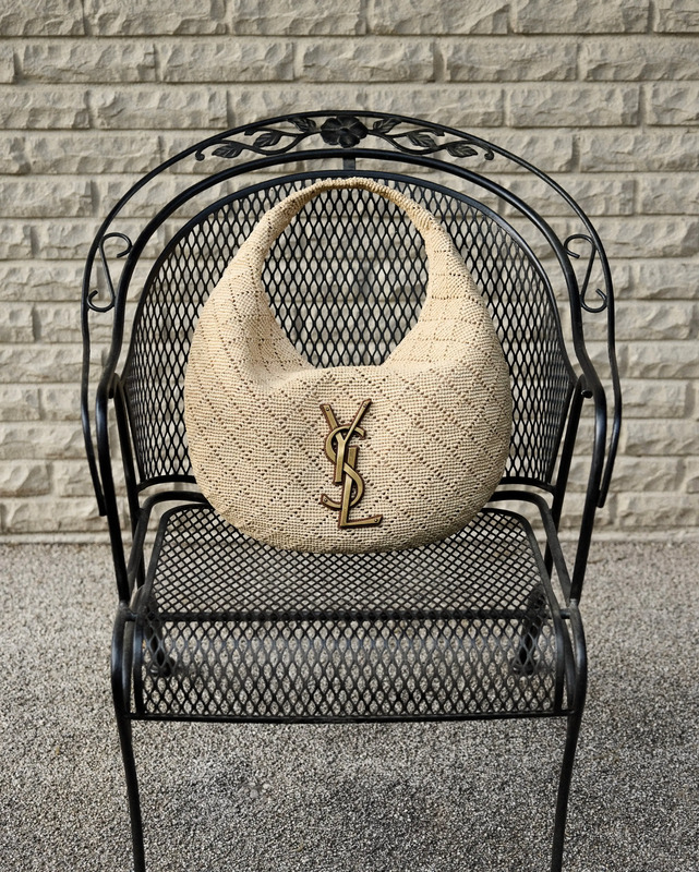 Sitting pretty. The handbag that won’t leave your side, lap, or outfit all summer. Peek at the latest woven wonders and leather loves by @ysl at the link in our bio.
