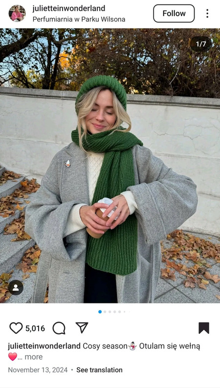 a woman wearing a green hat and scarf