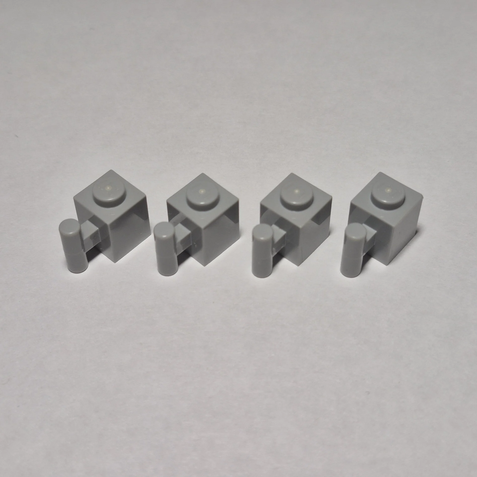 детали LEGO 2921 1x1 с ручкой (Bar Handle) — 4 шт.