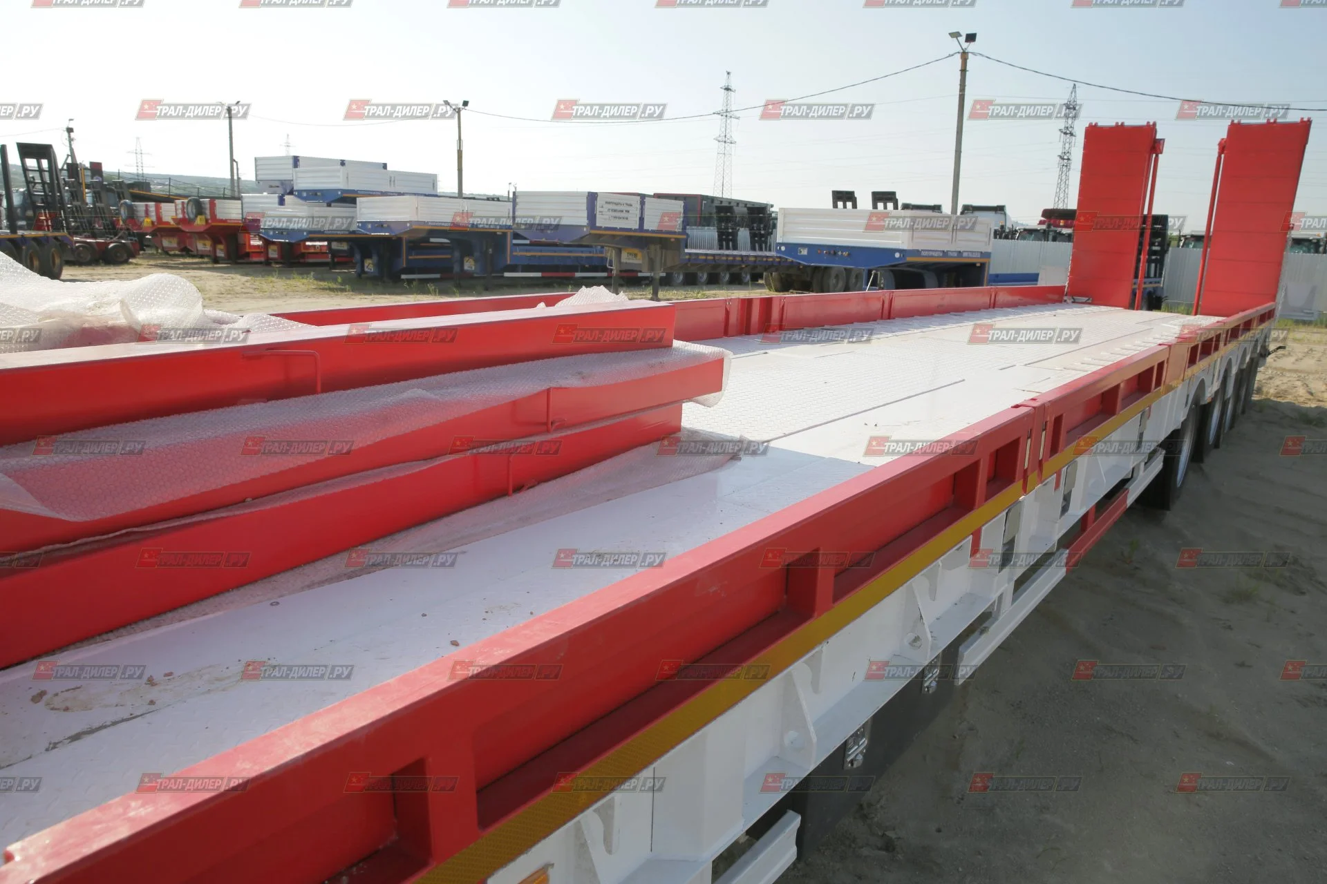 Раздвижной низкорамный трал Amur LYR9806TDPW 70 т - миниатюра 26