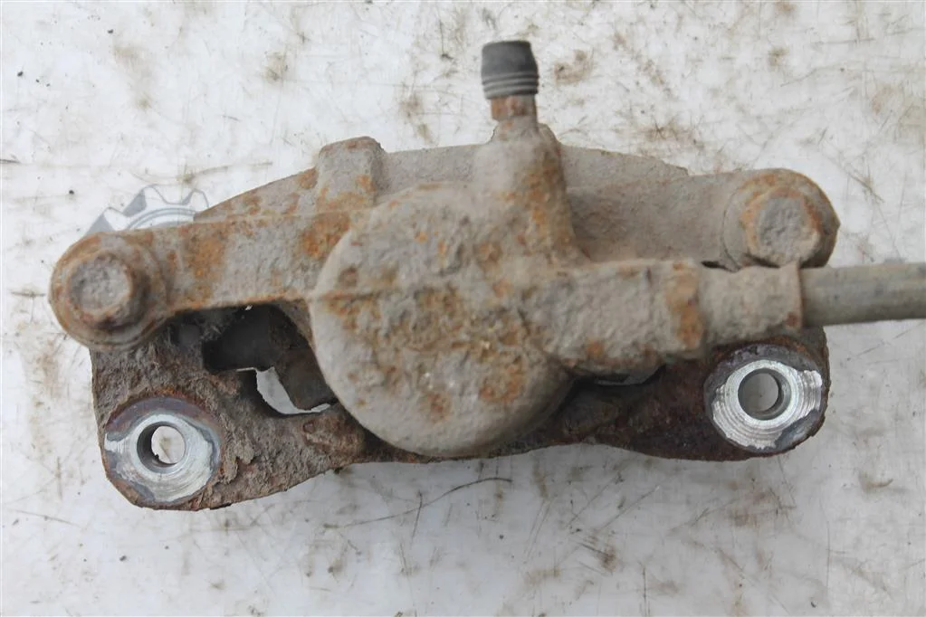 Суппорт задний левый Митсубиши Лансер 9 - миниатюра 4