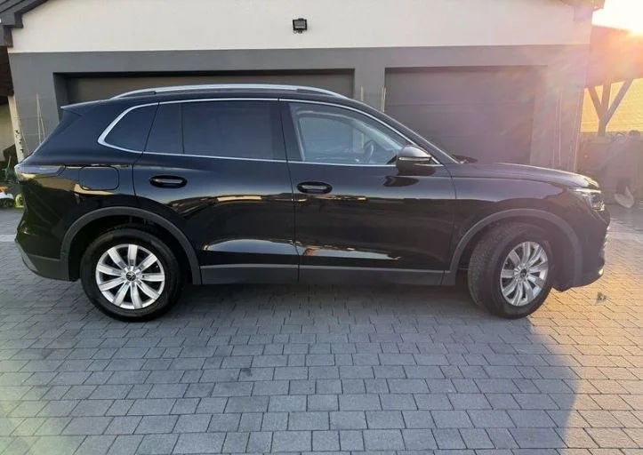 Volkswagen Tiguan - миниатюра 2