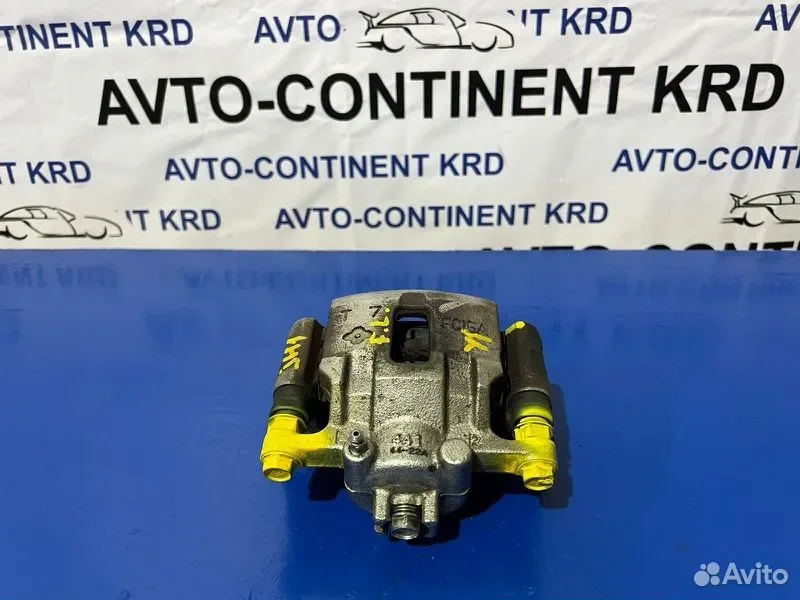 Суппорт тормозной передний левый Honda N-WGN JH1 - миниатюра 2