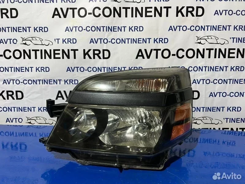 Фара левая Toyota Voxy AZR60 1AZ - изображение 1