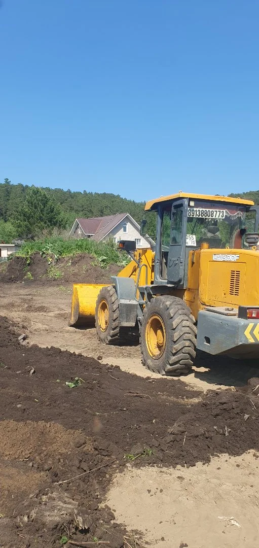 Услуги фронтального погрузчика ковш 2м3 - изображение 1