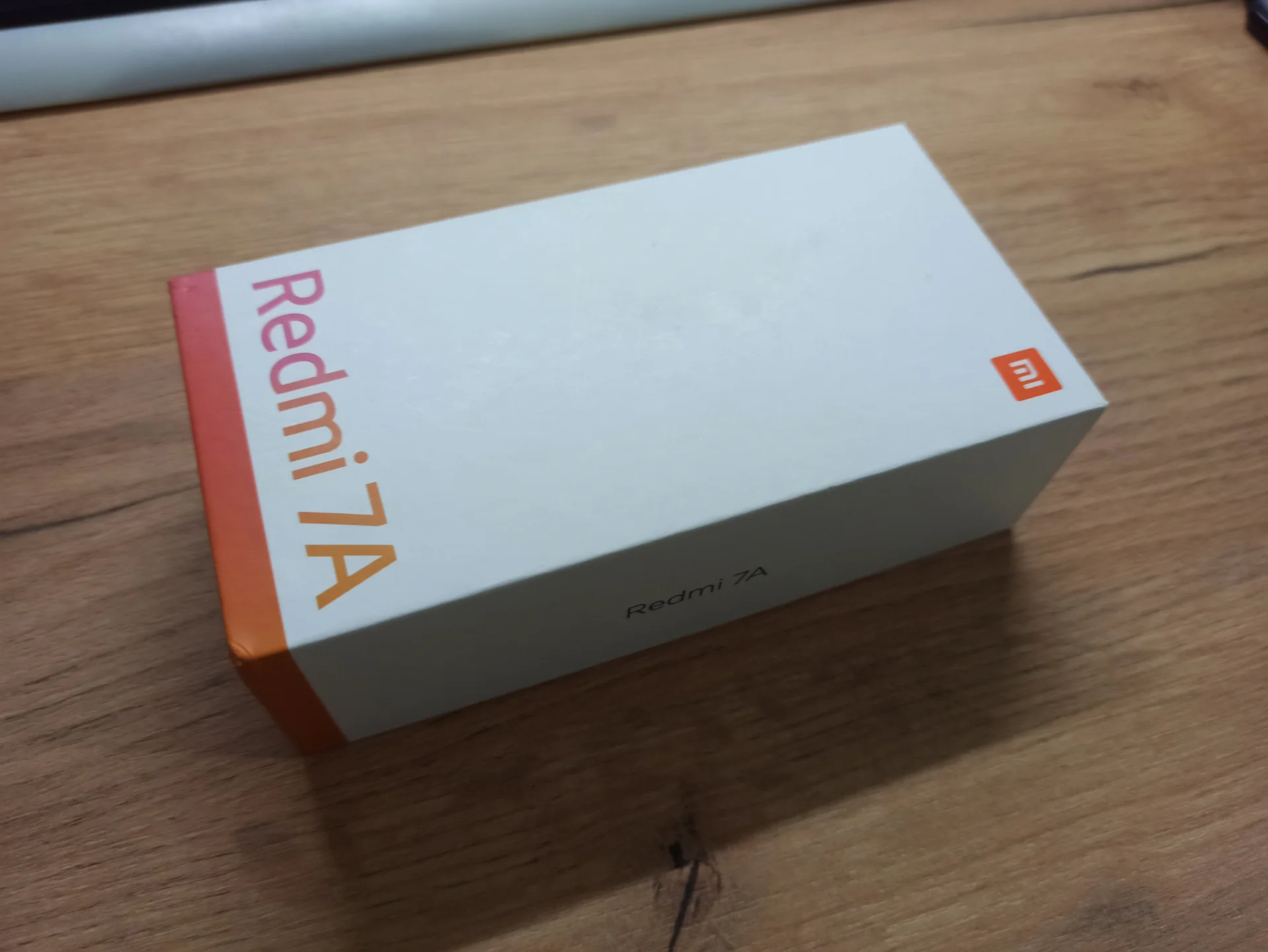 Смартфон Xiaomi Redmi 7A 2/32гб (Матовый черный) ("кирпич") - миниатюра 5