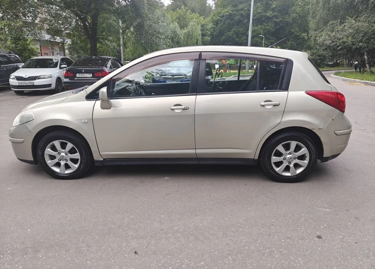 nissan tiida 1,6 - миниатюра 7
