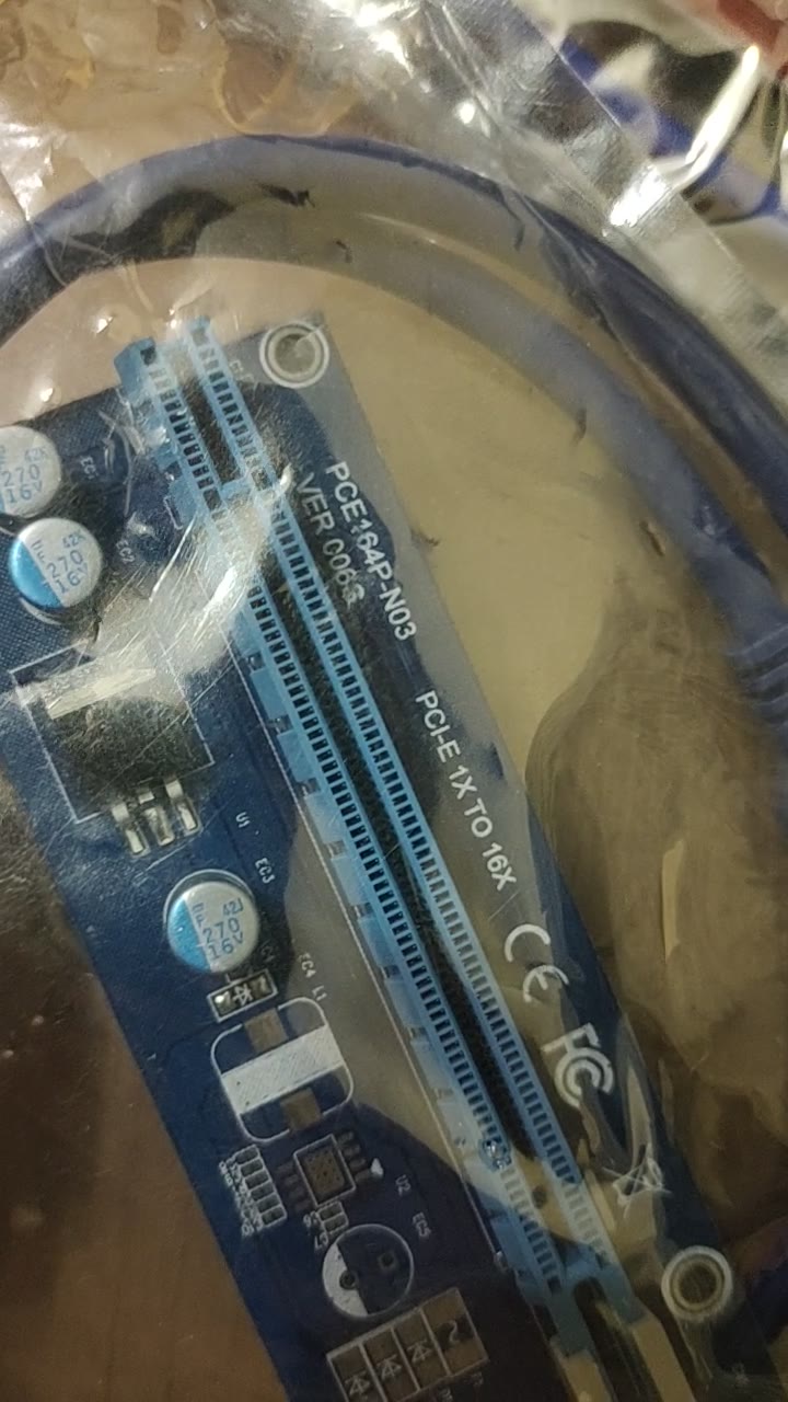 Переходник PCI-E x1 - PCI-E x16. Новый, запакованный.