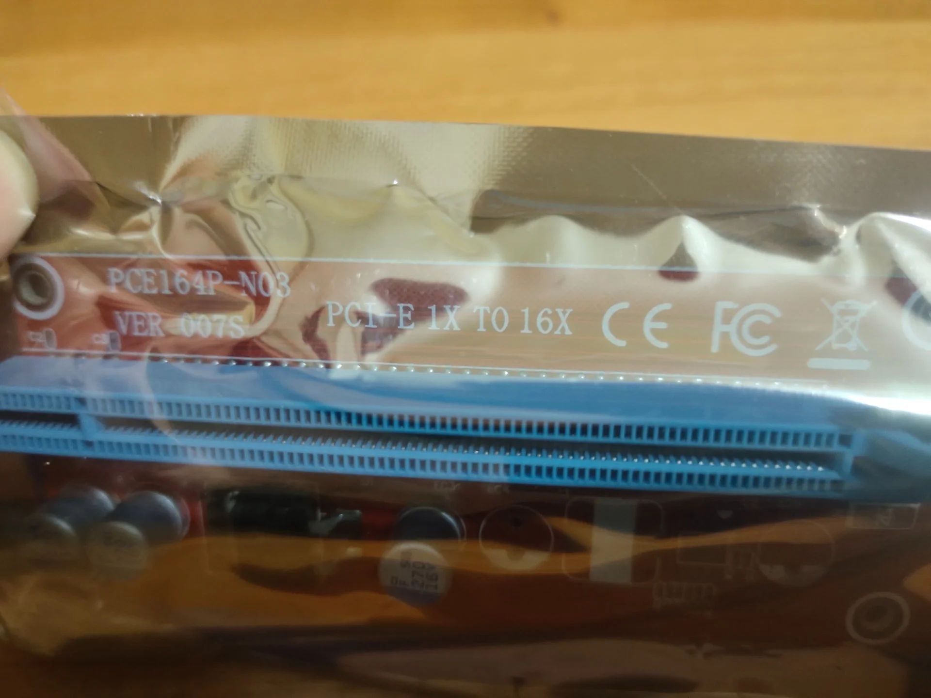 Переходник PCI-E x1 - PCI-E x16. Новый, запакованный. - миниатюра 2