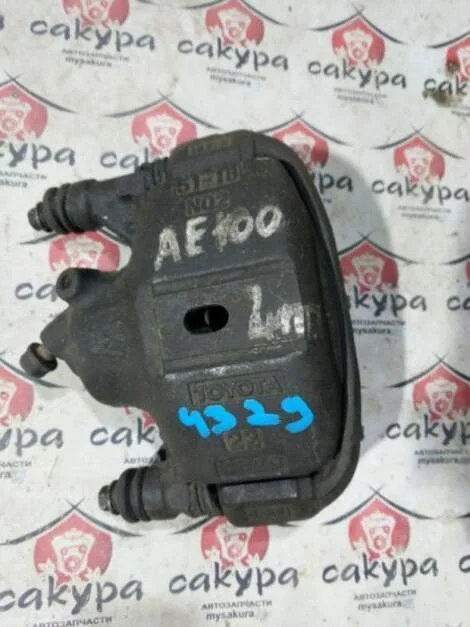 Суппорт Toyota Starlet EP95 4E-FE Лев. Перед.