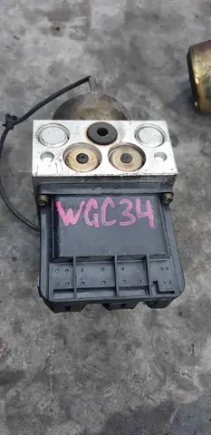 Блок abs Nissan Stagea WGC34 RB25DET
