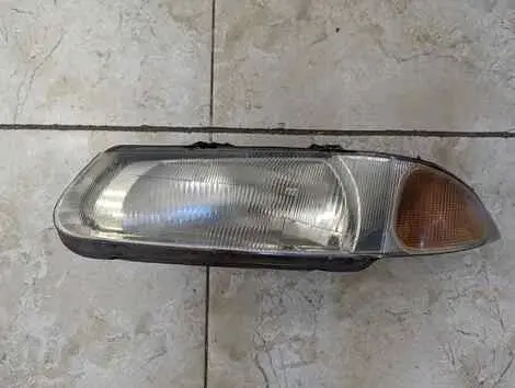 Фара Rover 200 R3 11 K2D Лев. Перед.