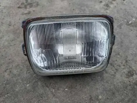 Фара Mitsubishi Delica Truck L069P 4D56 Лев. Перед.