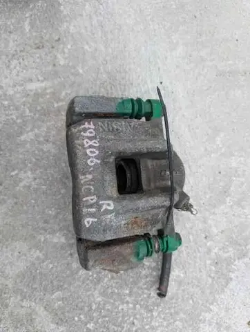 Суппорт Toyota Platz NCP16 2NZ-FE Прав. Перед.