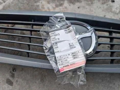 Решетка радиатора Mazda Familia BVY11 QG13DE - миниатюра 4