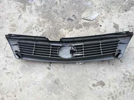 Решетка радиатора Mazda Familia BVY11 QG13DE - миниатюра 5