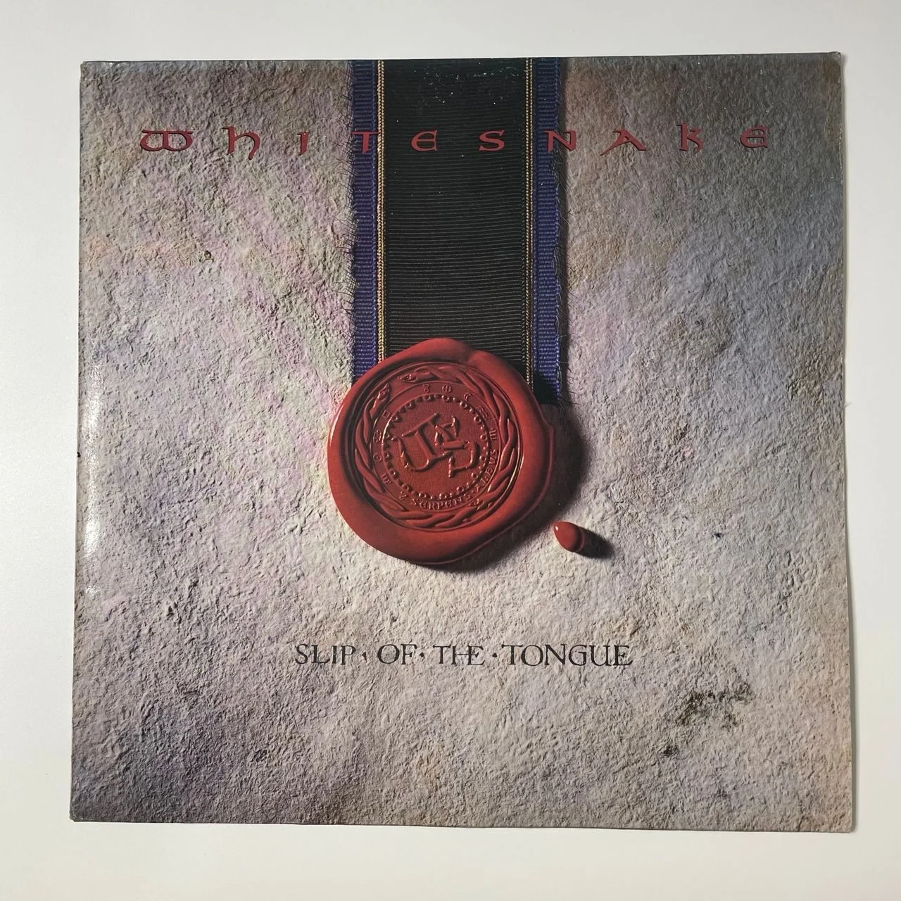 Винтажная виниловая пластинка LP Whitesnake Slip Of The Tongue (Англия 1989)