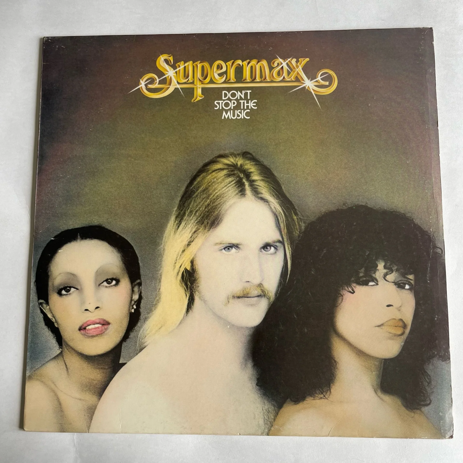 Винтажная виниловая пластинка LP Supermax Don't Stop The Music (Германия 1977)