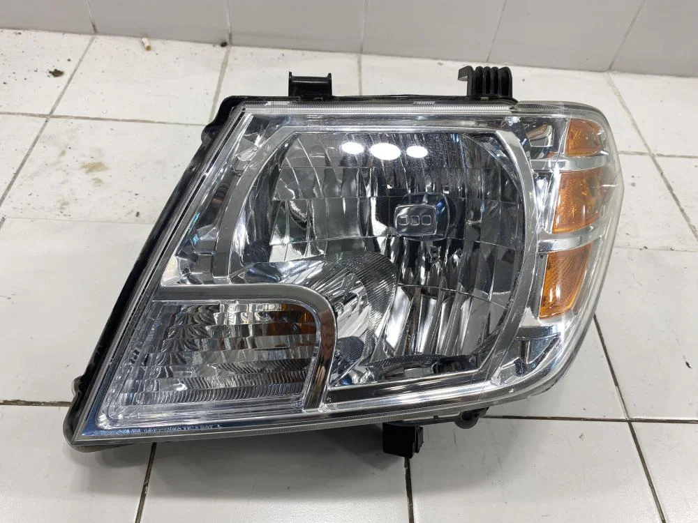 Фара левая Nissan Navara D40 (2004—2010) - изображение 1