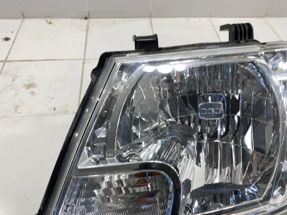 Фара левая Nissan Navara D40 (2004—2010) - миниатюра 4