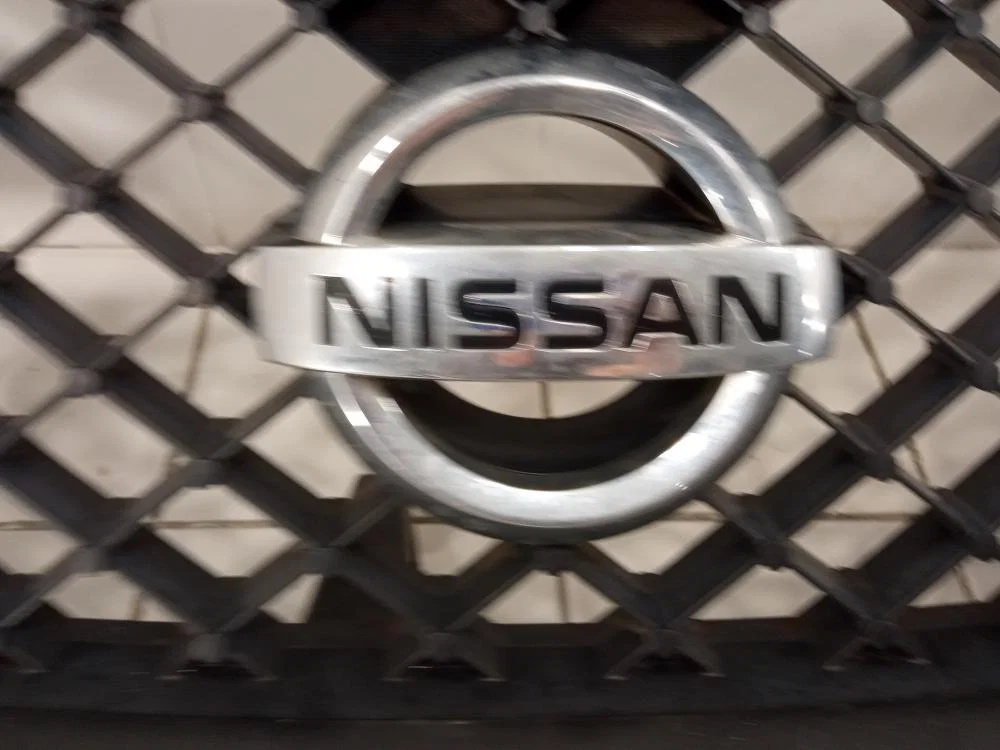 Решетка радиатора Nissan Armada I рестайлинг (2007—2016) - миниатюра 9