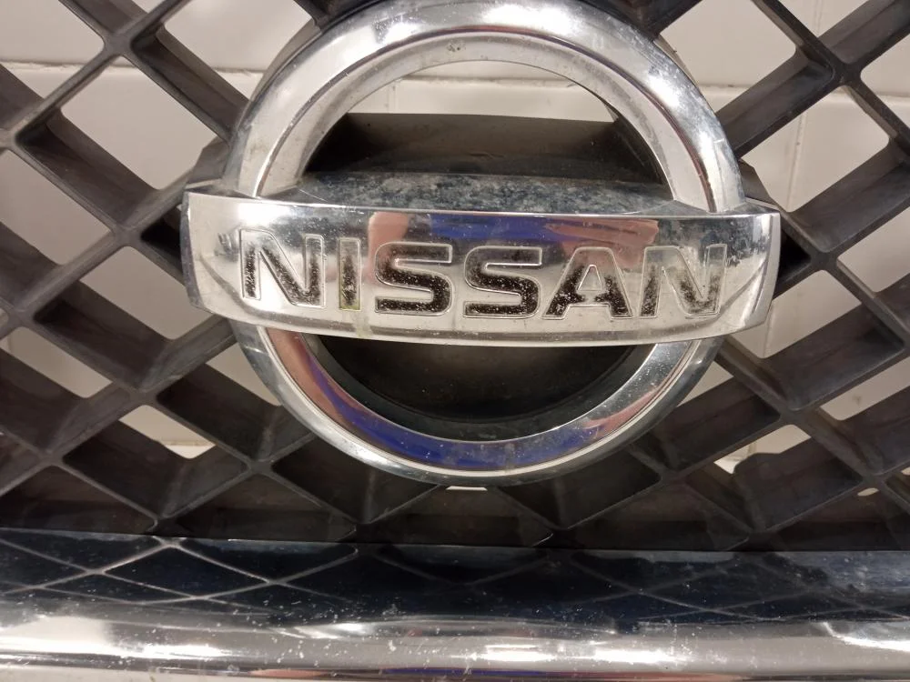Решетка радиатора Nissan Armada I (2003—2007) - миниатюра 10