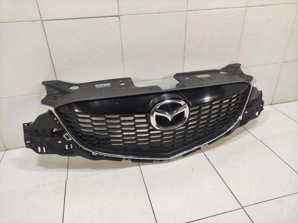 Решетка радиатора Mazda CX-5 I (2011—2015) - миниатюра 4