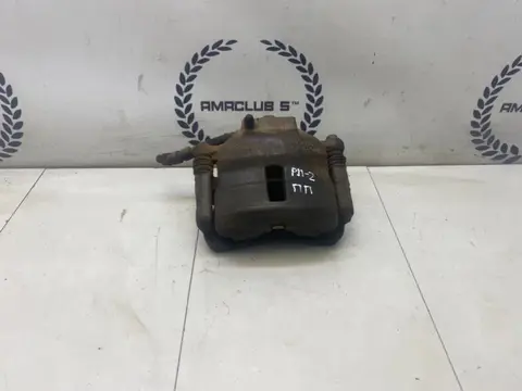 Суппорт передний правый Nissan Primera P11 1.6