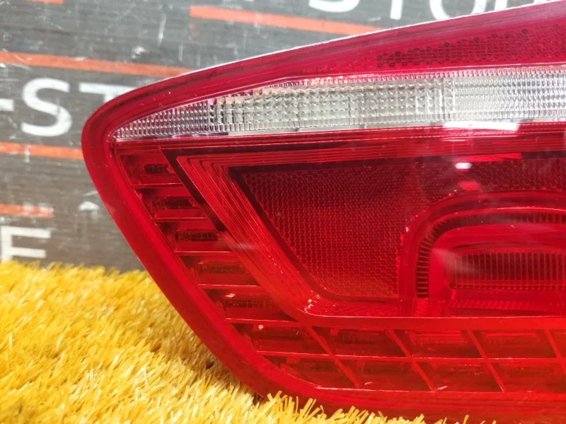 Фонарь крышки багажника левый Volkswagen Passat B7 - миниатюра 2