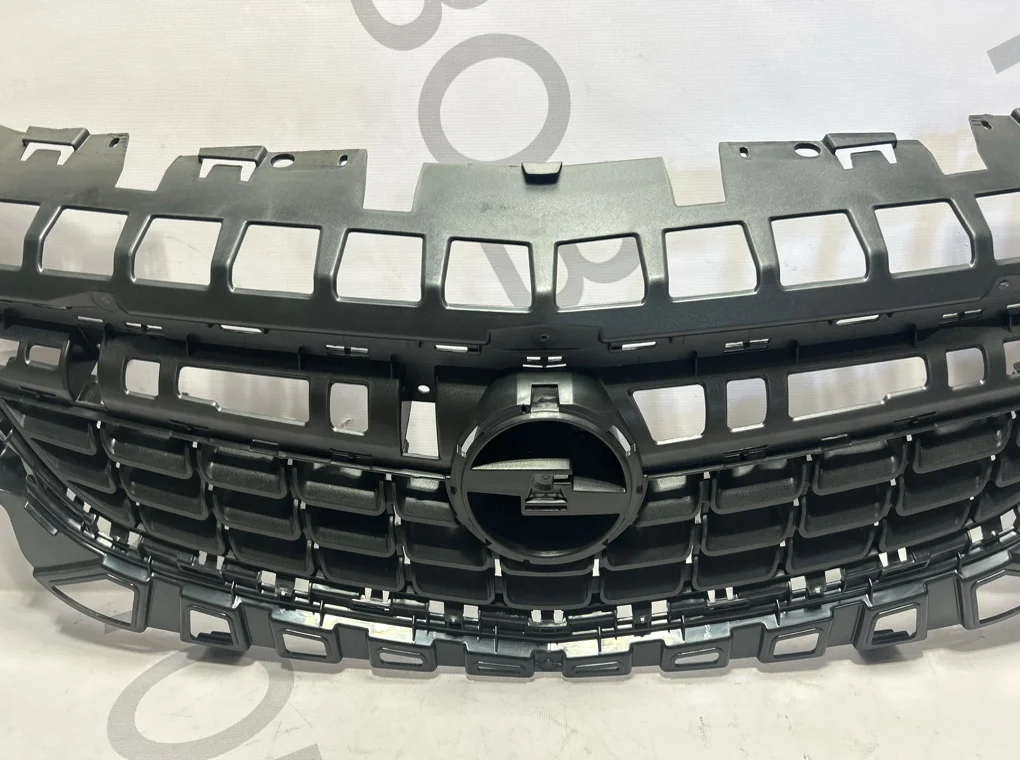 Решетка радиатора Opel Astra 2009-2013 - миниатюра 4